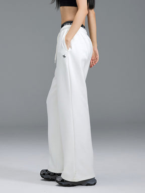 裏起毛 ロゴ入りバンド  レイヤード風 ワイドパンツ