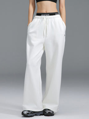 裏起毛 ロゴ入りバンド  レイヤード風 ワイドパンツ