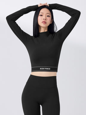 ロゴ入りバンド モックネック  クロップド丈 長袖