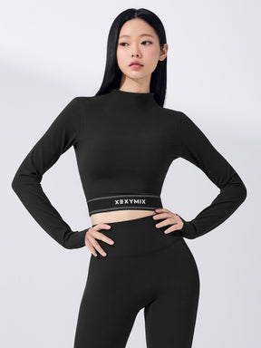 ロゴ入りバンド モックネック  クロップド丈 長袖