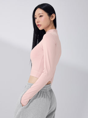 ロゴ入りバンド モックネック  クロップド丈 長袖