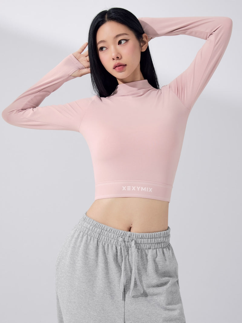 ロゴ入りバンド モックネック  クロップド丈 長袖