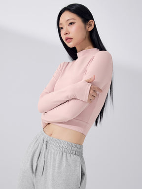 ロゴ入りバンド モックネック  クロップド丈 長袖