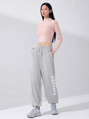 ロゴ入りバンド モックネック  クロップド丈 長袖