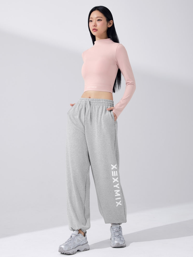 ロゴ入りバンド モックネック  クロップド丈 長袖