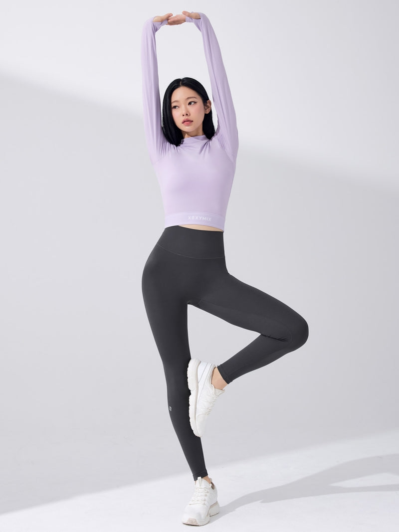 ロゴ入りバンド モックネック  クロップド丈 長袖