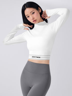 ロゴ入りバンド モックネック  クロップド丈 長袖