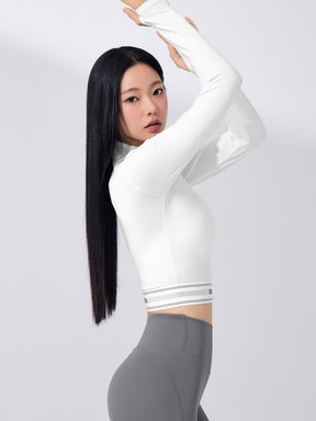 ロゴ入りバンド モックネック  クロップド丈 長袖